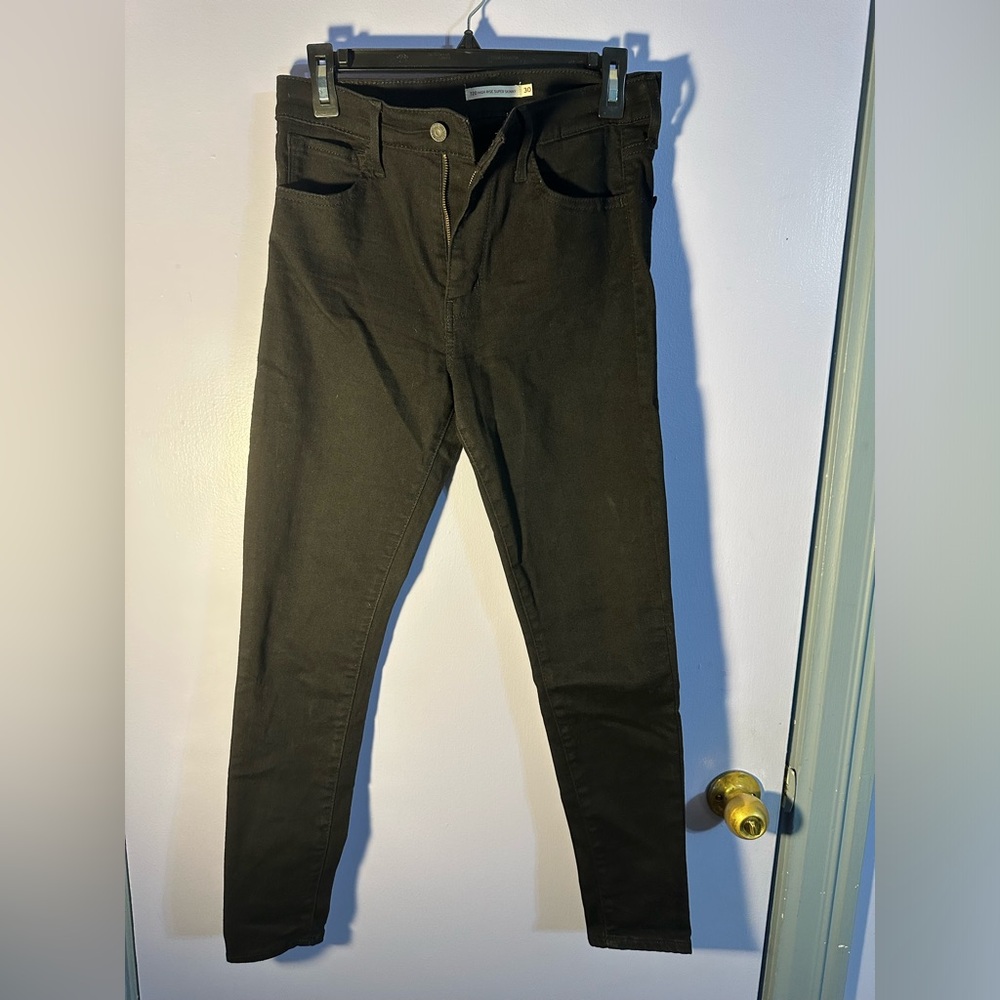 Levi black skinny jeans - size 30 (L)